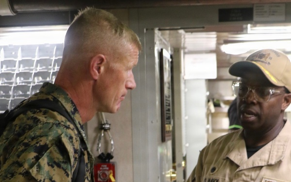 U.S. Marine Corps Maj. Gen. John Jarrard talks with U.S. Sailors aboard the littoral combat ship USS Billings (LCS 15) while operating in the Caribbean Sea off the coast of Venezuela, July 7, 2026.
