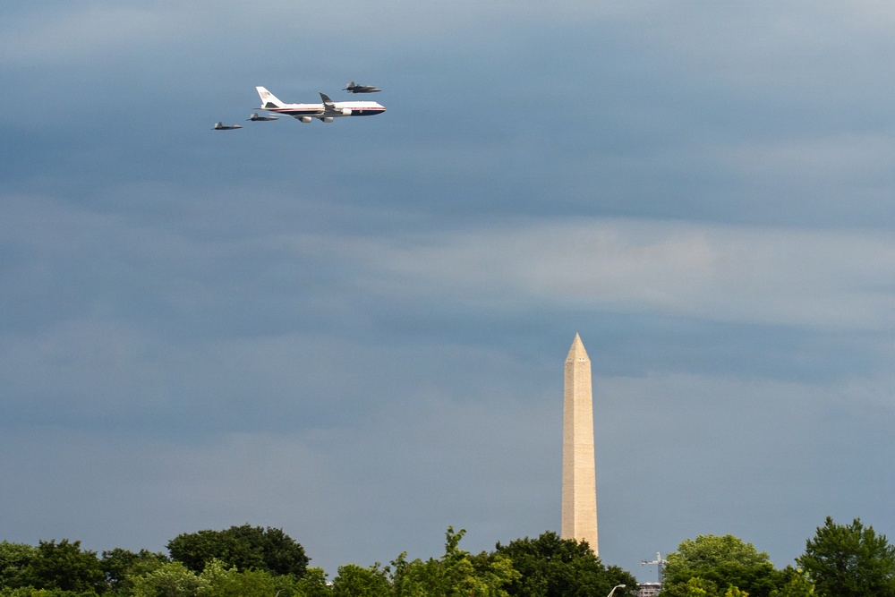 U.S. military aircraft conduct a formation flyover during the Salute to America celebration