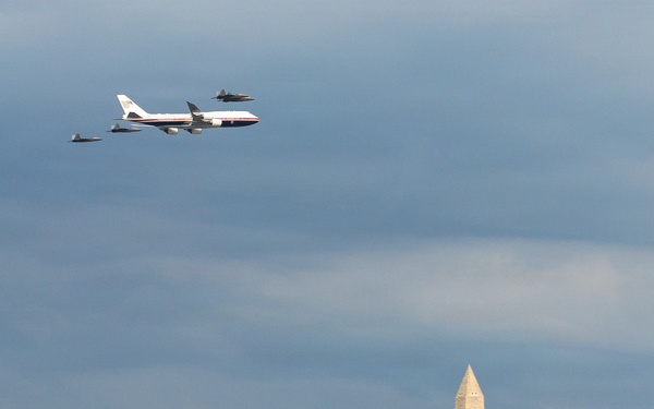 U.S. military aircraft conduct a formation flyover during the Salute to America celebration