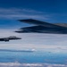 B-2 Stealth Bomber and an F-15E Strike Eagle participate in a live-fire sinking exercise as part of Valiant Shield 2026