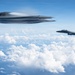 B-2 Stealth Bomber and an F-15E Strike Eagle participate in a live-fire sinking exercise as part of Valiant Shield 2026