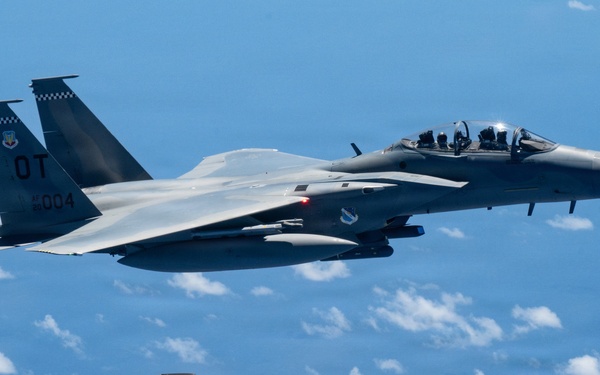 An MQ-28 Ghost Bat from Boeing Defense Australia and a U.S. Air Force F-15EX Eagle II participate in Valiant Shield 2026