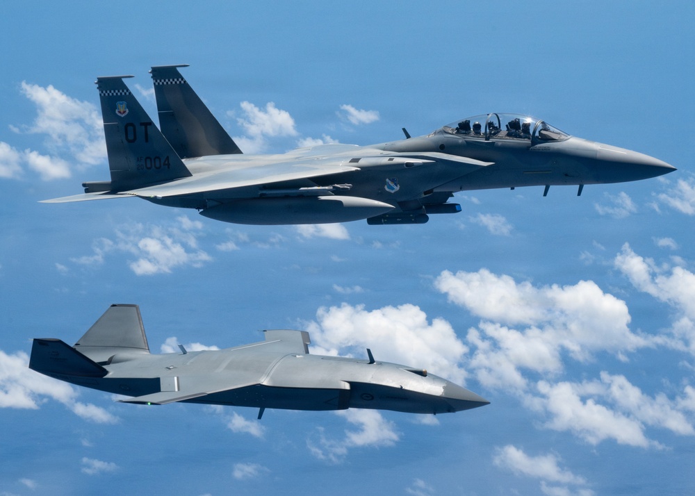 An MQ-28 Ghost Bat from Boeing Defense Australia and a U.S. Air Force F-15EX Eagle II participate in Valiant Shield 2026