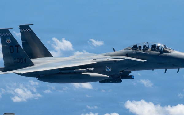 An MQ-28 Ghost Bat from Boeing Defense Australia and a U.S. Air Force F-15EX Eagle II participate in Valiant Shield 2026