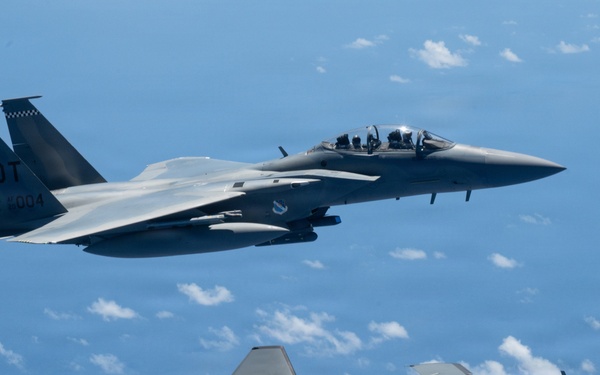 An MQ-28 Ghost Bat from Boeing Defense Australia and a U.S. Air Force F-15EX Eagle II participate in Valiant Shield 2026
