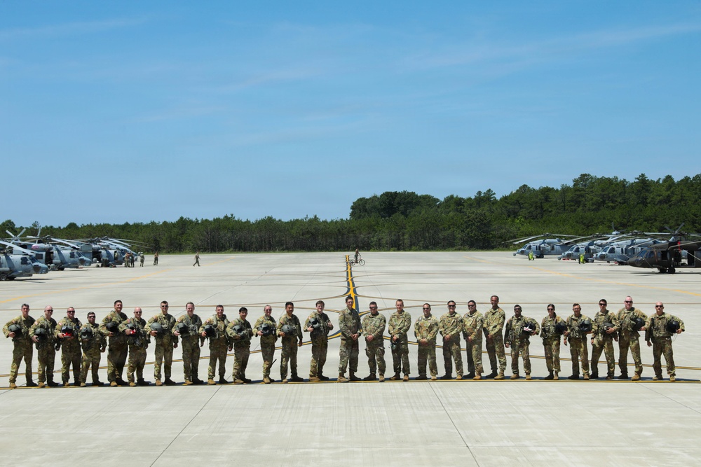 U.S. Army Soldiers and Navy Sailors participate in the Freedom 250th International Aerial Review