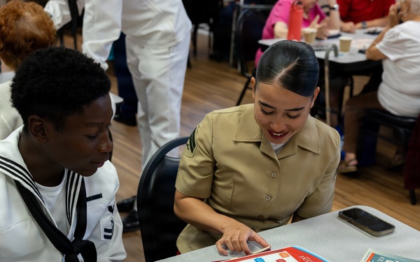 U.S. Marines attend the Great Kills Friendship Club for INR250