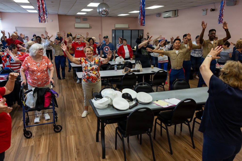 U.S. Marines attend the Great Kills Friendship Club for INR250