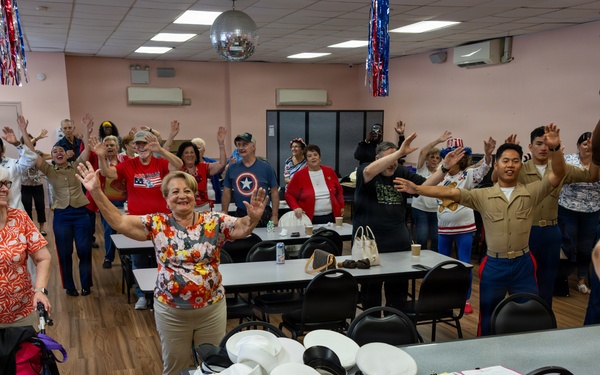 U.S. Marines attend the Great Kills Friendship Club for INR250