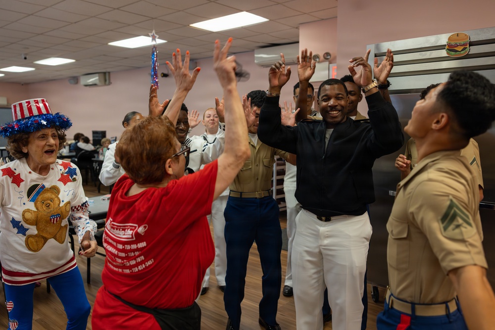U.S. Marines attend the Great Kills Friendship Club for INR250