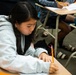 94th Army Air and Missile Defense Command Soldiers volunteer to help with STEM prortion of the Youth Impact Program