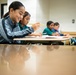 94th Army Air and Missile Defense Command Soldiers volunteer to help with STEM prortion of the Youth Impact Program