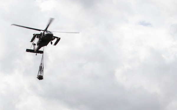 Joint Task Force - Bravo conducts a Sling Load operation to assist local Panamanian community