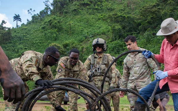Joint Task Force - Bravo conducts a Sling Load operation to assist local Panamanian community