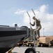 JTF-DC Guardsman inspects Special Purpose Brigade Boat