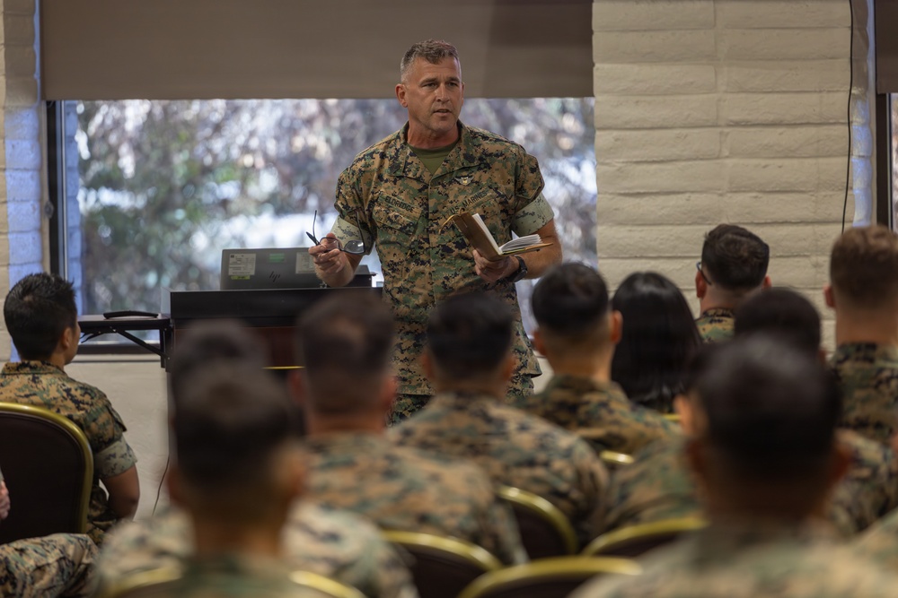 1st MLG senior leaders speak to staff and officers during a small unit leader training
