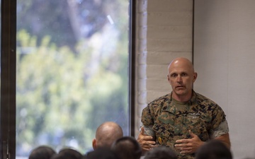 1st MLG senior leaders speak to staff and officers during a small unit leader training