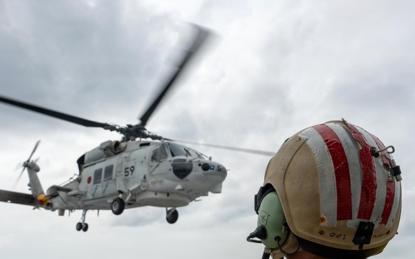USCGC Midgett (WMSL 757) conducts cross-deck flight operations with Japan Maritime Self-Defense Force