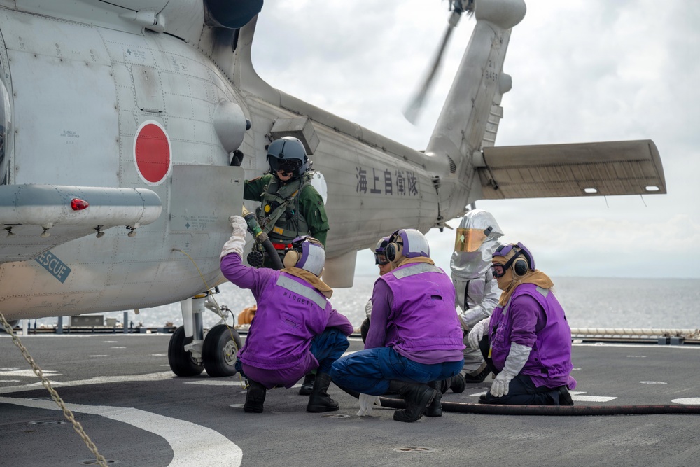 USCGC Midgett (WMSL 757) conducts cross-deck flight operations with Japan Maritime Self-Defense Force