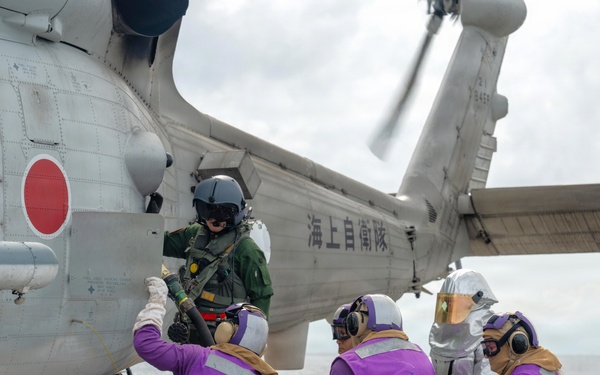 USCGC Midgett (WMSL 757) conducts cross-deck flight operations with Japan Maritime Self-Defense Force