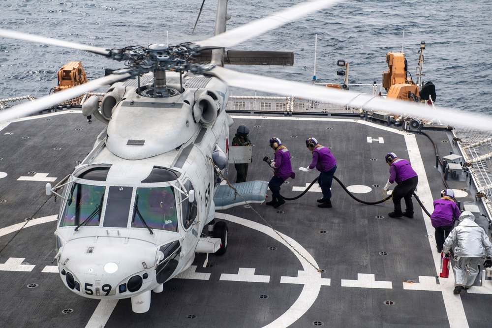 USCGC Midgett (WMSL 757) conducts cross-deck flight operations with Japan Maritime Self-Defense Force