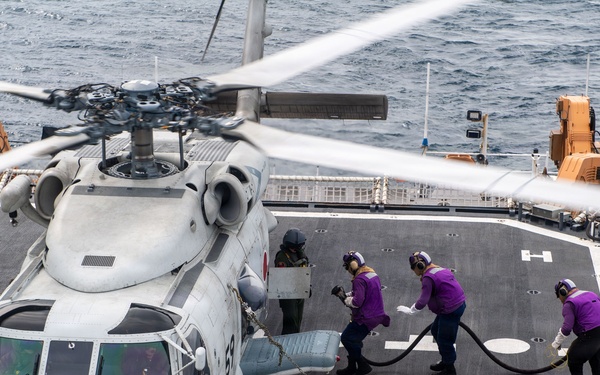 USCGC Midgett (WMSL 757) conducts cross-deck flight operations with Japan Maritime Self-Defense Force