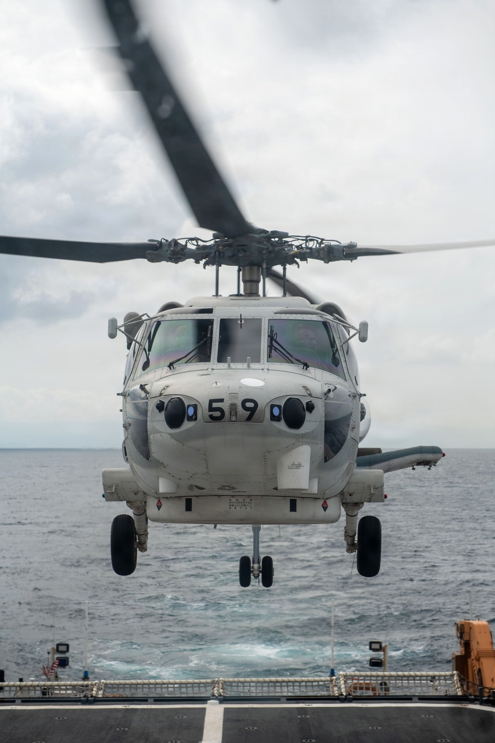 USCGC Midgett (WMSL 757) conducts cross-deck flight operations with Japan Maritime Self-Defense Force