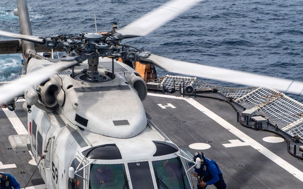 USCGC Midgett (WMSL 757) conducts cross-deck flight operations with Japan Maritime Self-Defense Force