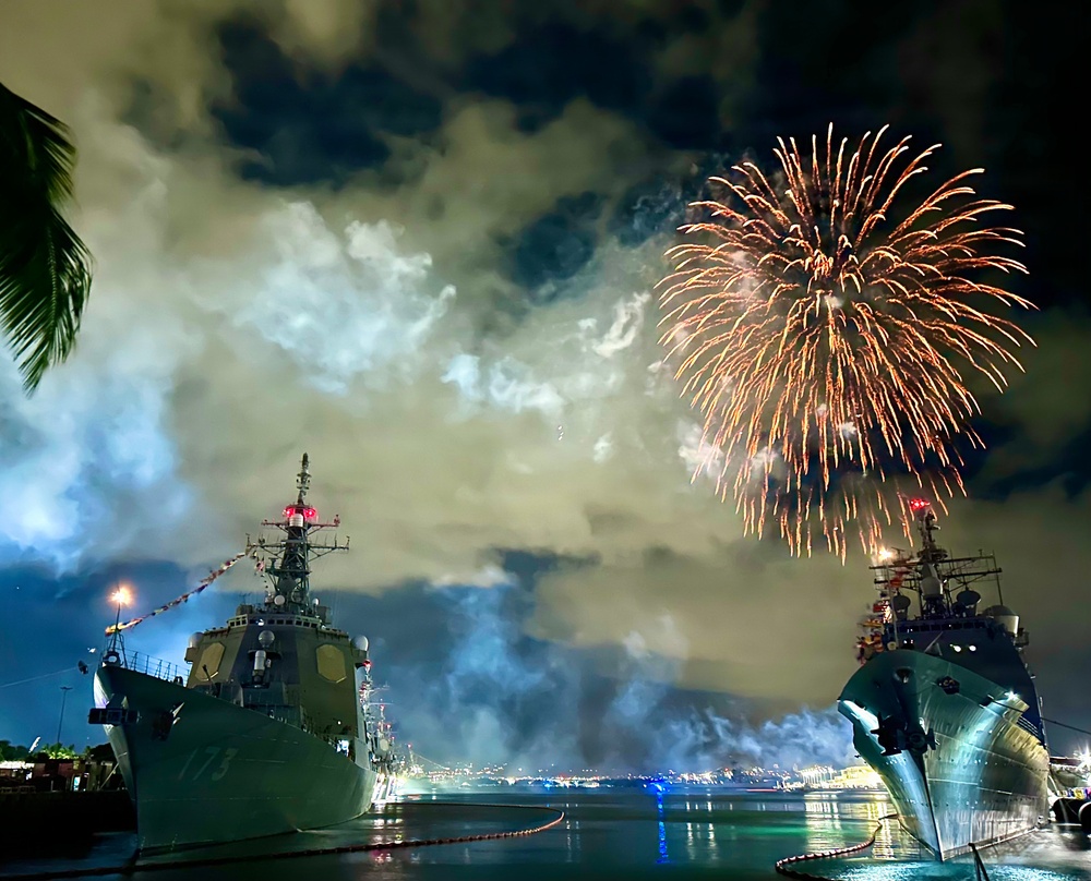 Fireworks illuminate JS KONGO during U.S. Independence Day celebrations