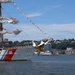 U.S. Coast Guard Cutter Eagle (WIX 327) displays signal flags as it transits the Hudson River near the Royal Moroccan Navy frigate RMNS Mohammed VI (701) during International Naval Review 250