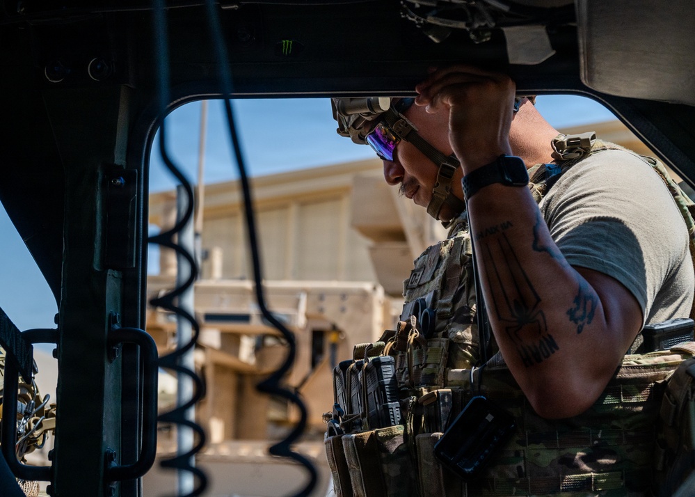 Security Forces airmen conduct routine patrol in the USCENTCOM