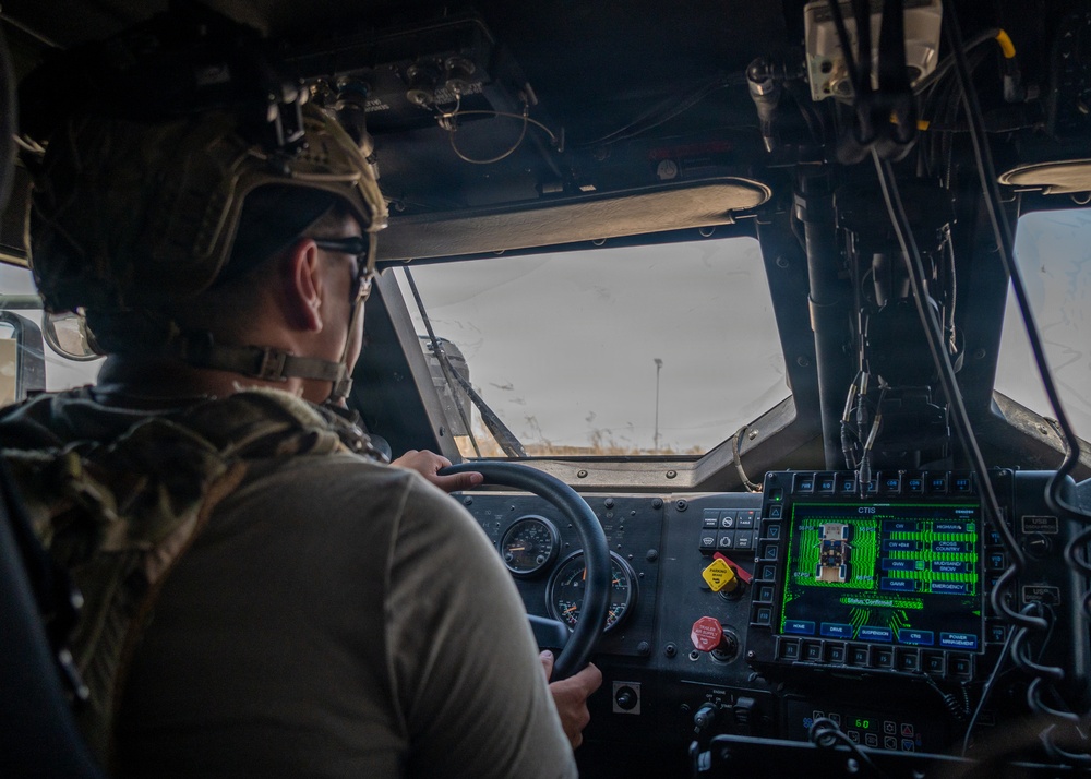 Security Forces airmen conduct routine patrol in the USCENTCOM
