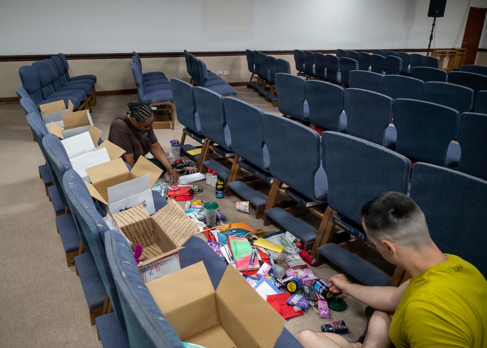 Chaplain team facilitates volunteers for care package organization