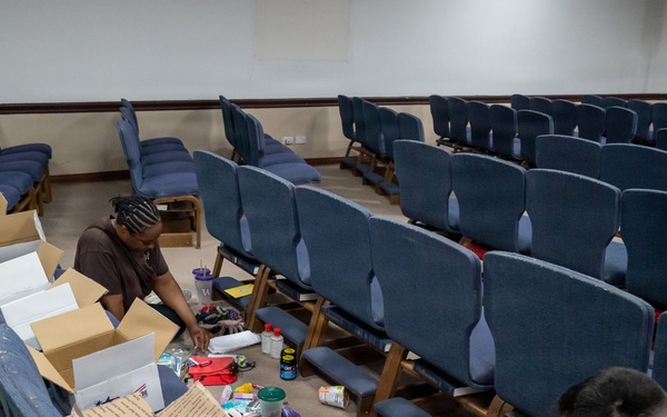 Chaplain team facilitates volunteers for care package organization