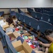 Chaplain team facilitates volunteers for care package organization