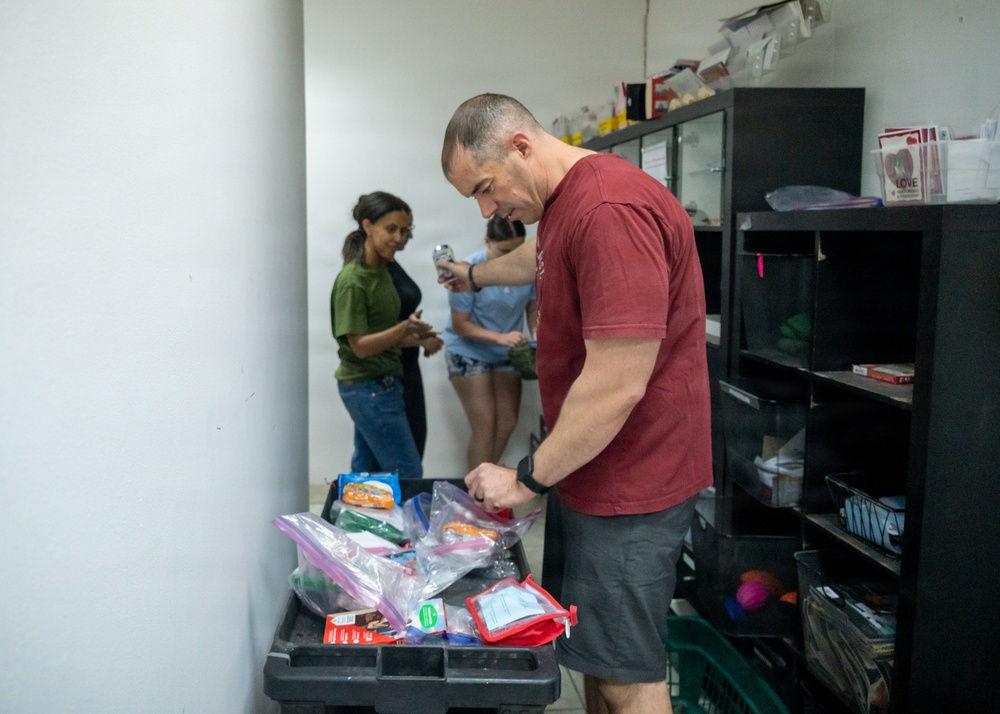 Chaplain team facilitates volunteers for care package organization