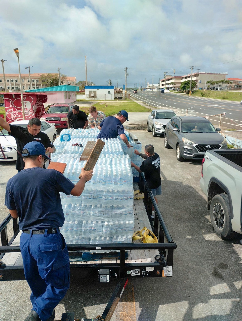 U.S. Coast Guard transports water in concert with damage assessments for port recovery