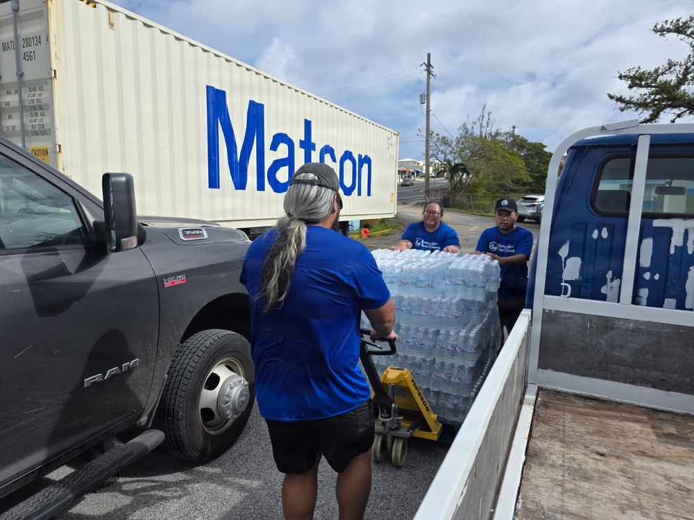 U.S. Coast Guard transports water in concert with damage assessments for port recovery