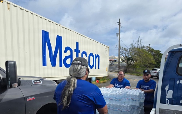 U.S. Coast Guard transports water in concert with damage assessments for port recovery