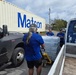 U.S. Coast Guard transports water in concert with damage assessments for port recovery
