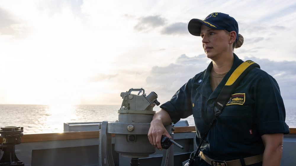 USS Mustin conducts a replenishment-at-sea with USNS Carl Brashear
