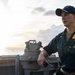 USS Mustin conducts a replenishment-at-sea with USNS Carl Brashear