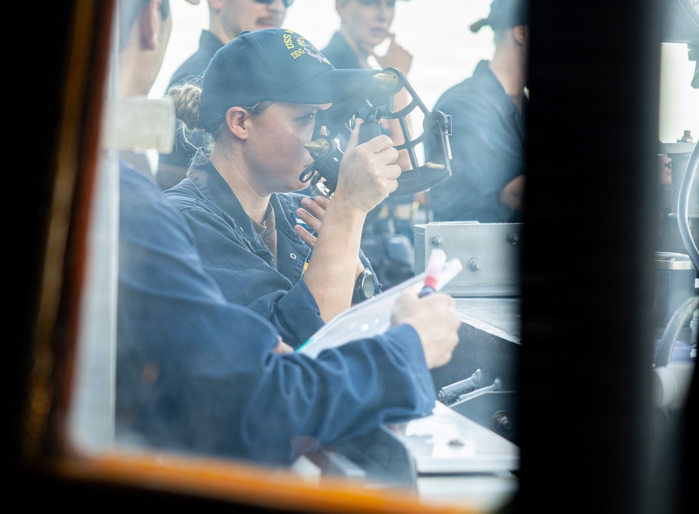 USS Mustin conducts a replenishment-at-sea with USNS Carl Brashear