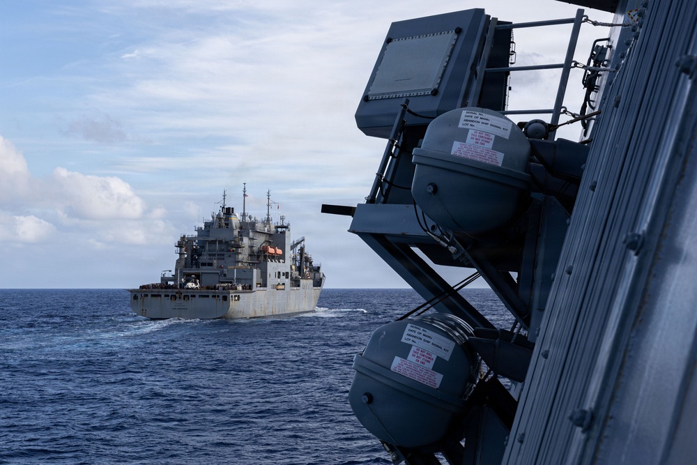 USS Mustin conducts a replenishment-at-sea with USNS Carl Brashear