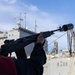 USS Mustin conducts a replenishment-at-sea with USNS Carl Brashear