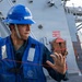 USS Mustin conducts a replenishment-at-sea with USNS Carl Brashear
