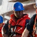 USS Mustin conducts a replenishment-at-sea with USNS Carl Brashear