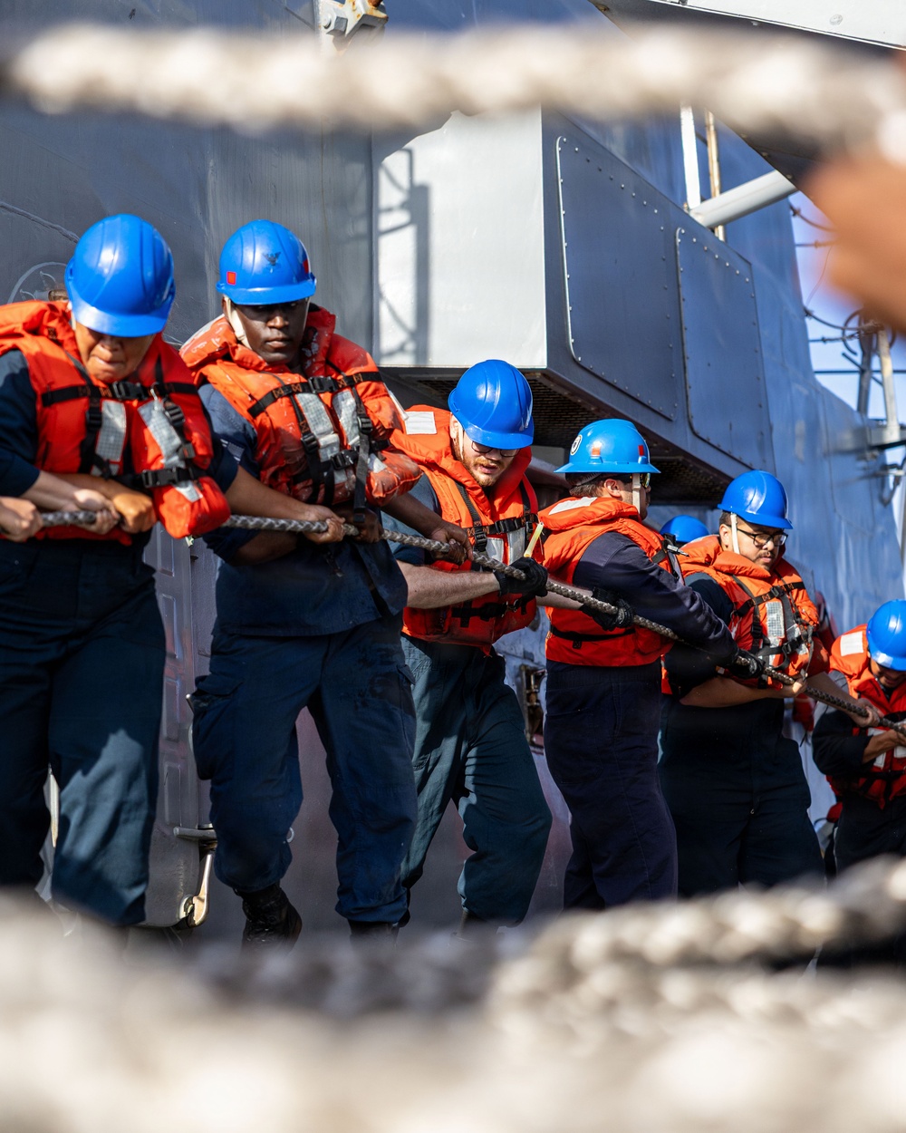 USS Mustin conducts a replenishment-at-sea with USNS Carl Brashear