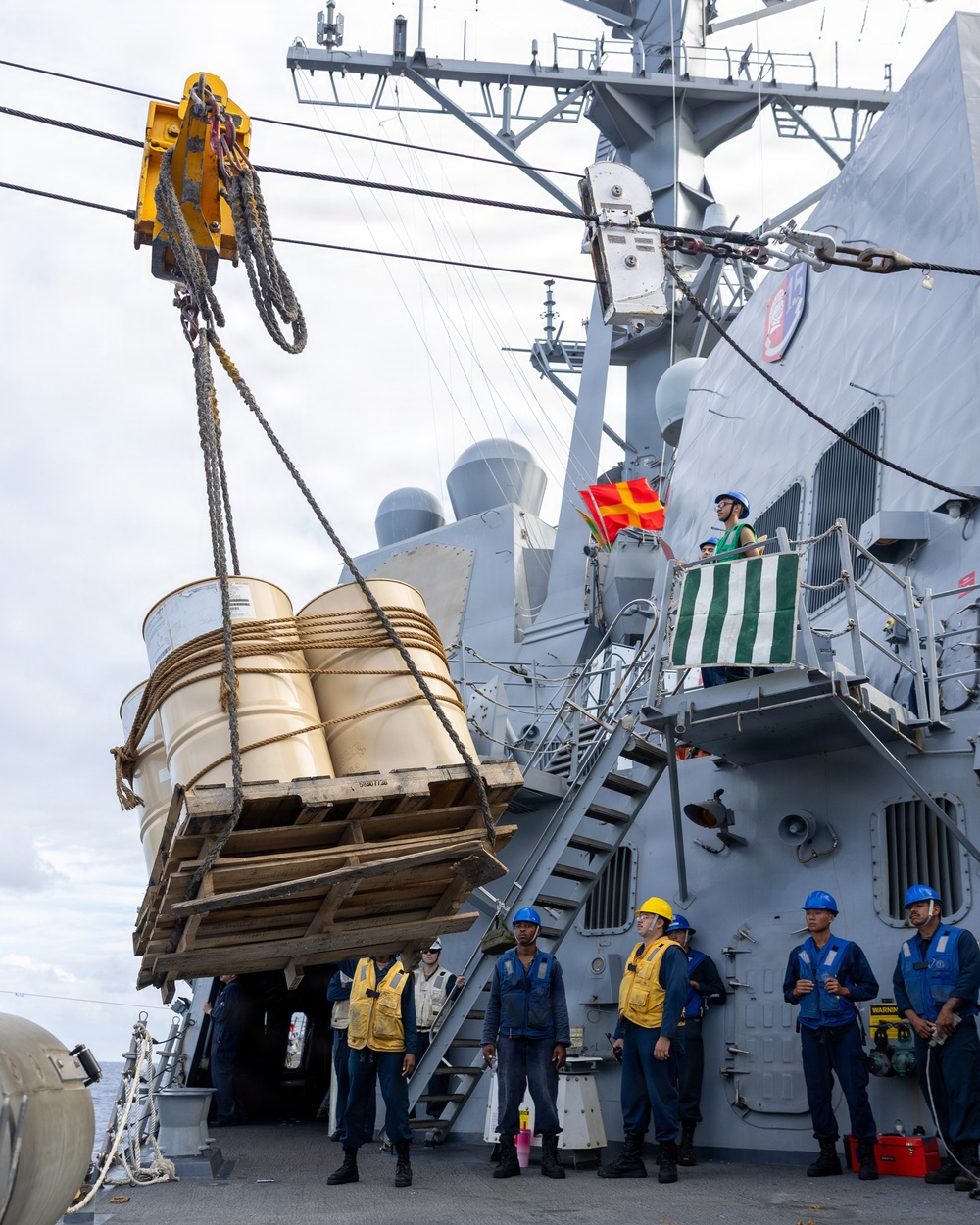 USS Mustin conducts a replenishment-at-sea with USNS Carl Brashear