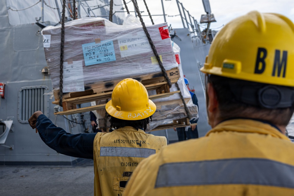 USS Mustin conducts a replenishment-at-sea with USNS Carl Brashear